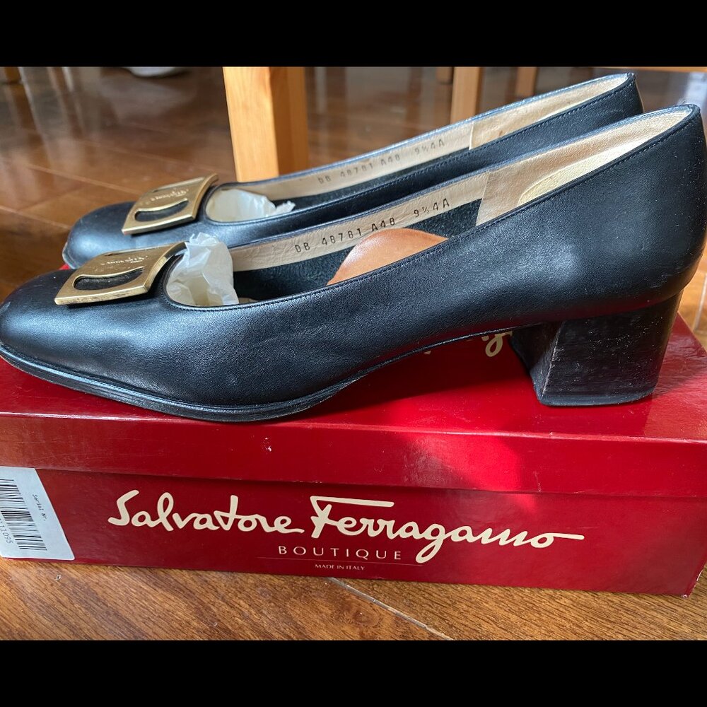 Salvatore Ferragamo black pumps with gold buckle